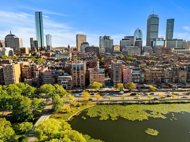 a view of a city with tall buildings