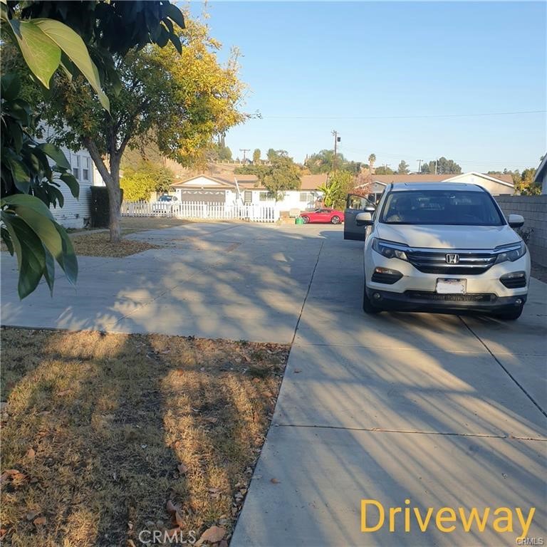 166 North Lemon Avenue Walnut, CA 91789 - Photo 14 of 16 a car parked on the side of the road