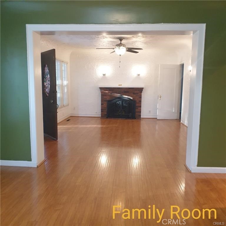 166 North Lemon Avenue Walnut, CA 91789 - Photo 8 of 16 a view of kitchen and hallway with wooden floor