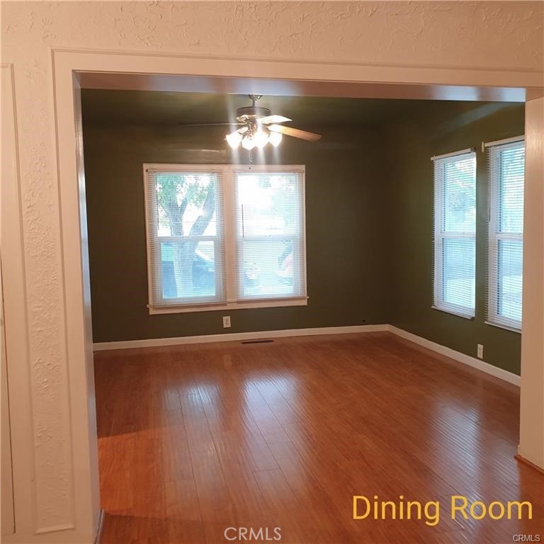 166 North Lemon Avenue Walnut, CA 91789 - Photo 9 of 16 a view of an empty room with wooden floor and a window
