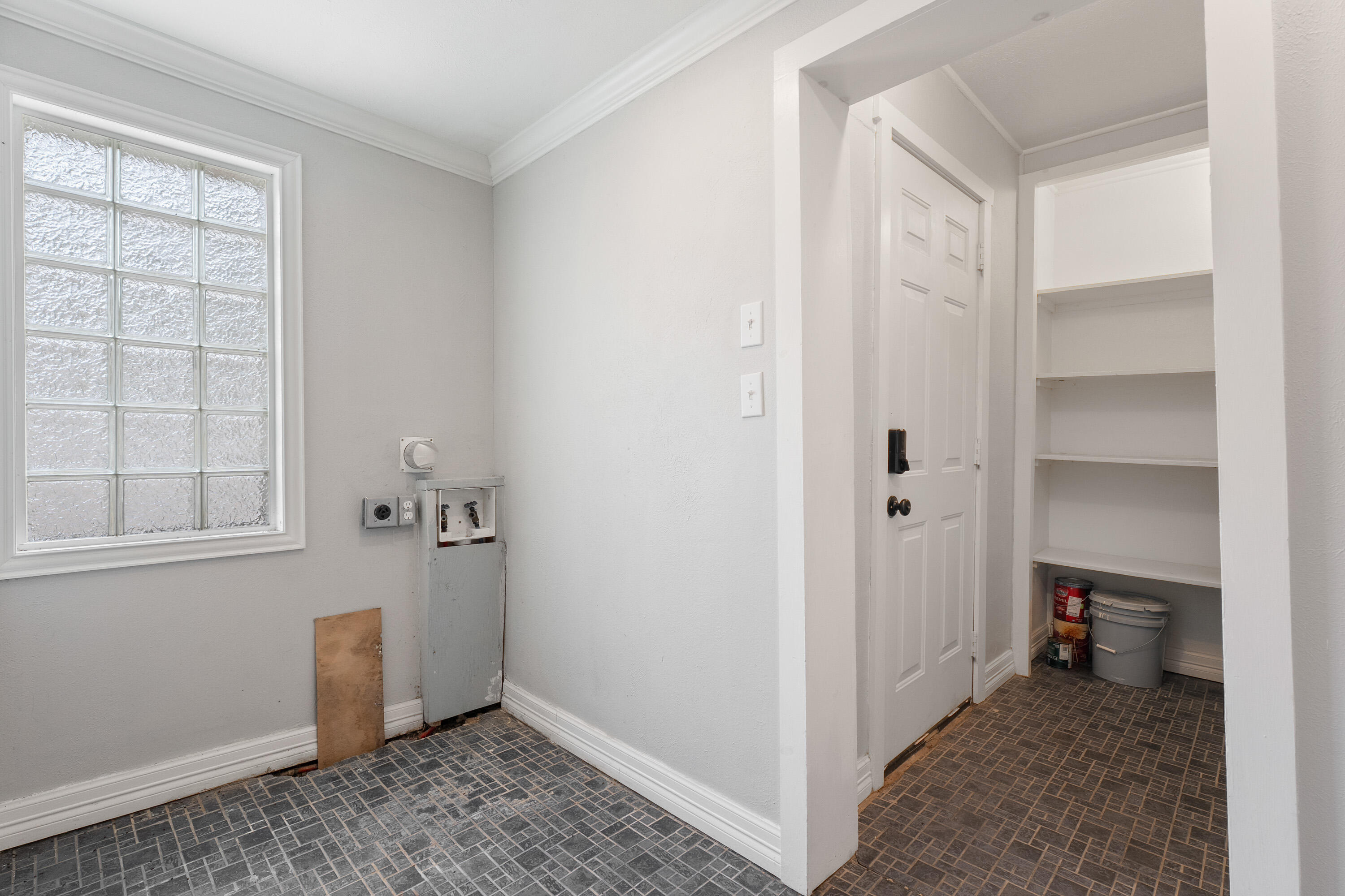 2702 23rd Street Lubbock, TX 79410 - Photo 12 of 30 a view of an empty room with a closet