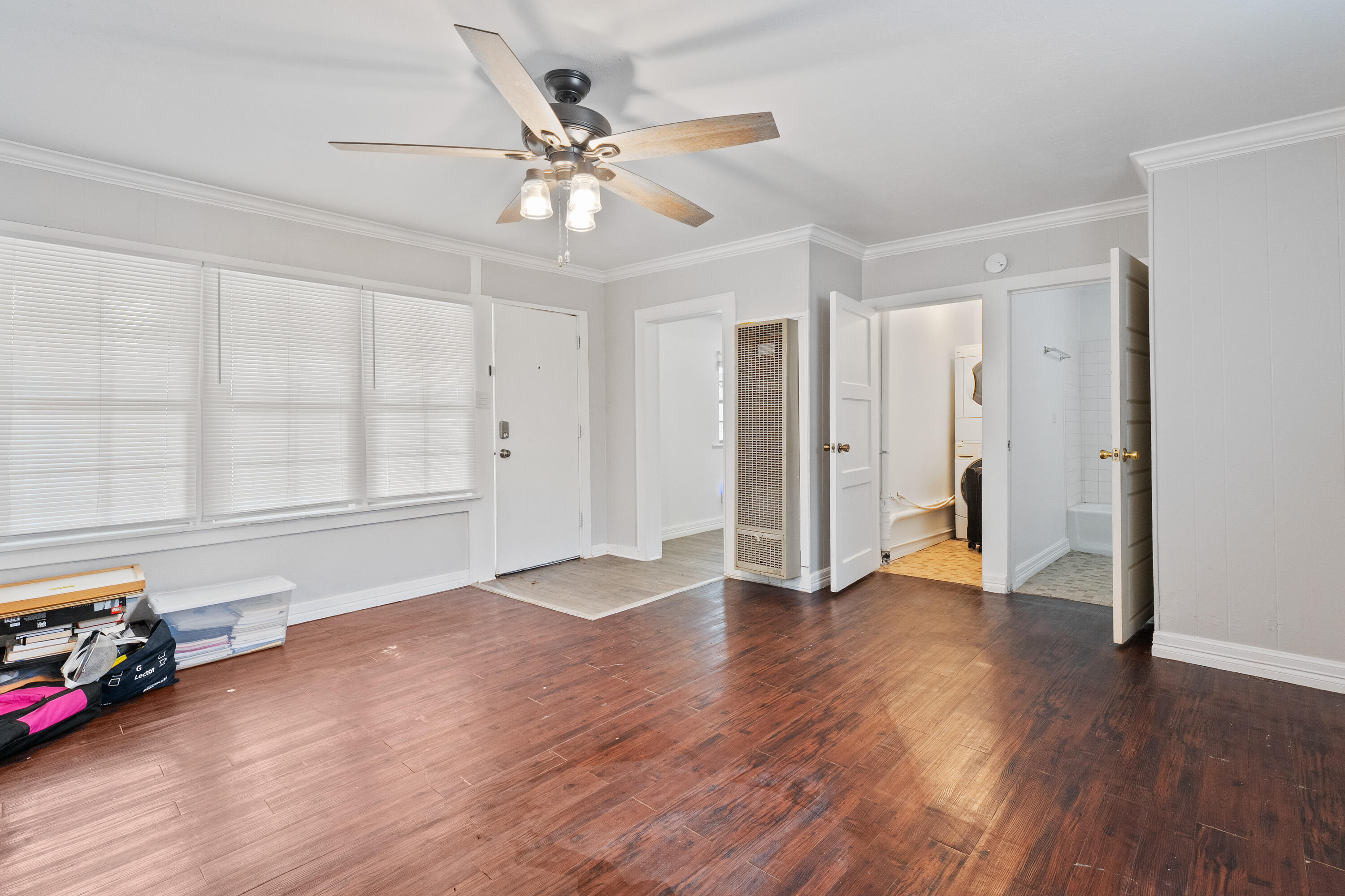 2702 23rd Street Lubbock, TX 79410 - Photo 24 of 30 a view of an empty room with wooden floor