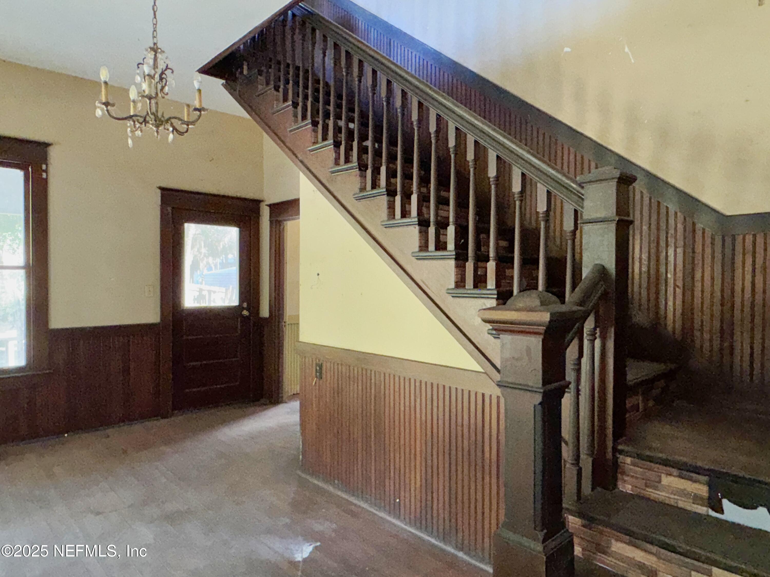 225 Lake George Road Seville, FL 32190 - Photo 12 of 37 a view of entryway and hall with wooden floor