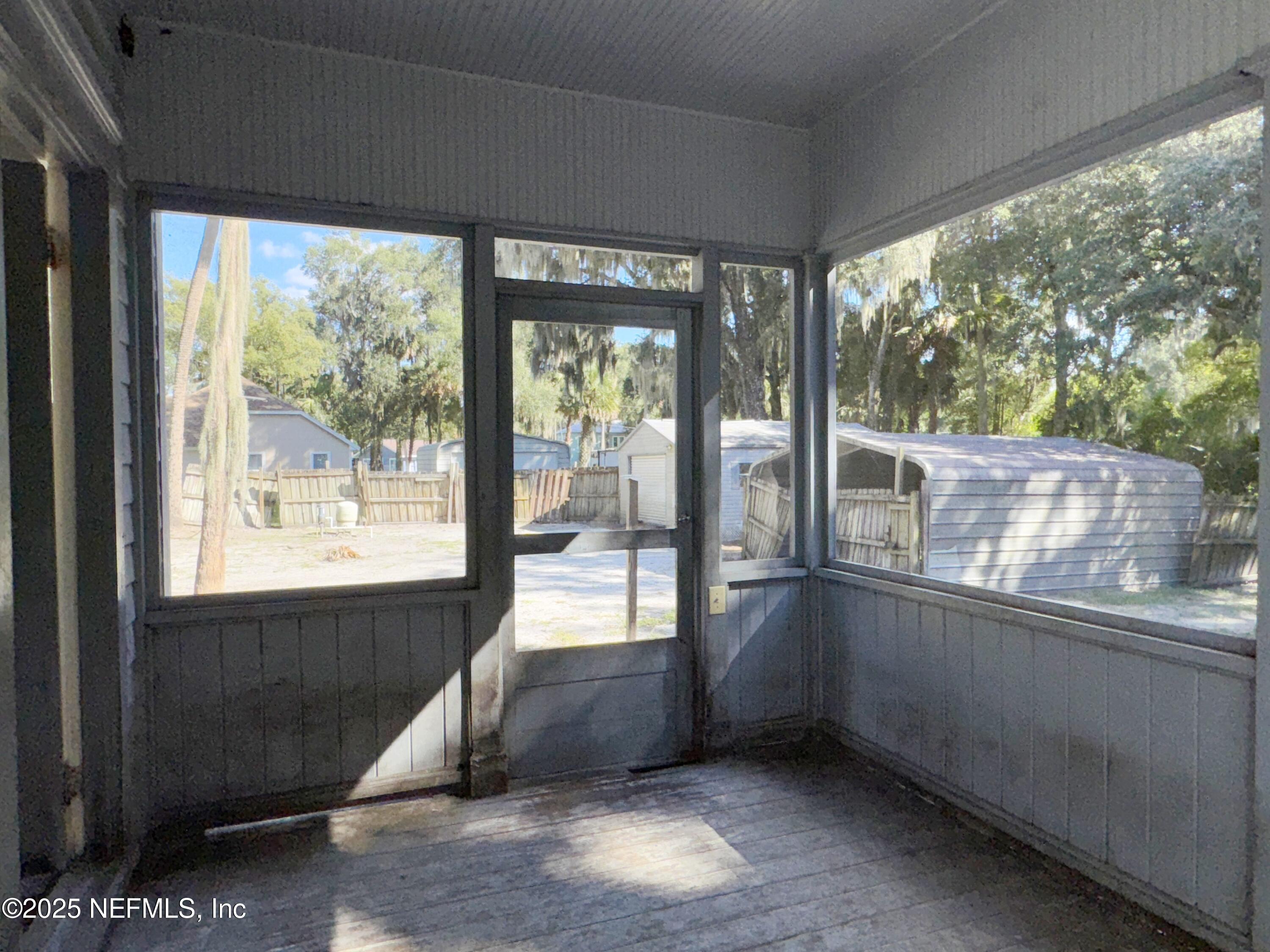 225 Lake George Road Seville, FL 32190 - Photo 20 of 37 a view of an empty room with a window