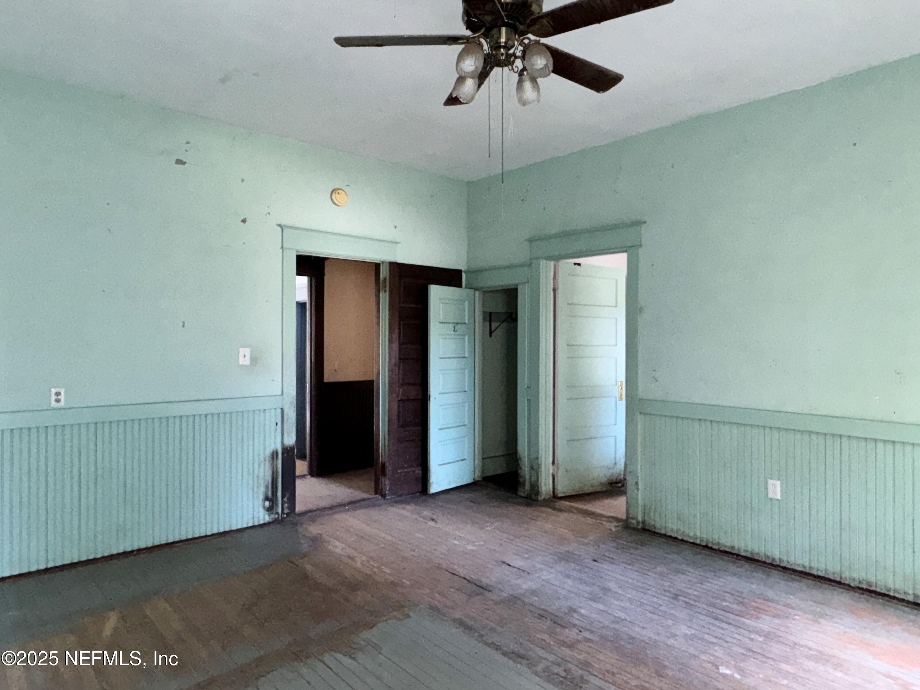 225 Lake George Road Seville, FL 32190 - Photo 25 of 37 a view of an empty room with a window