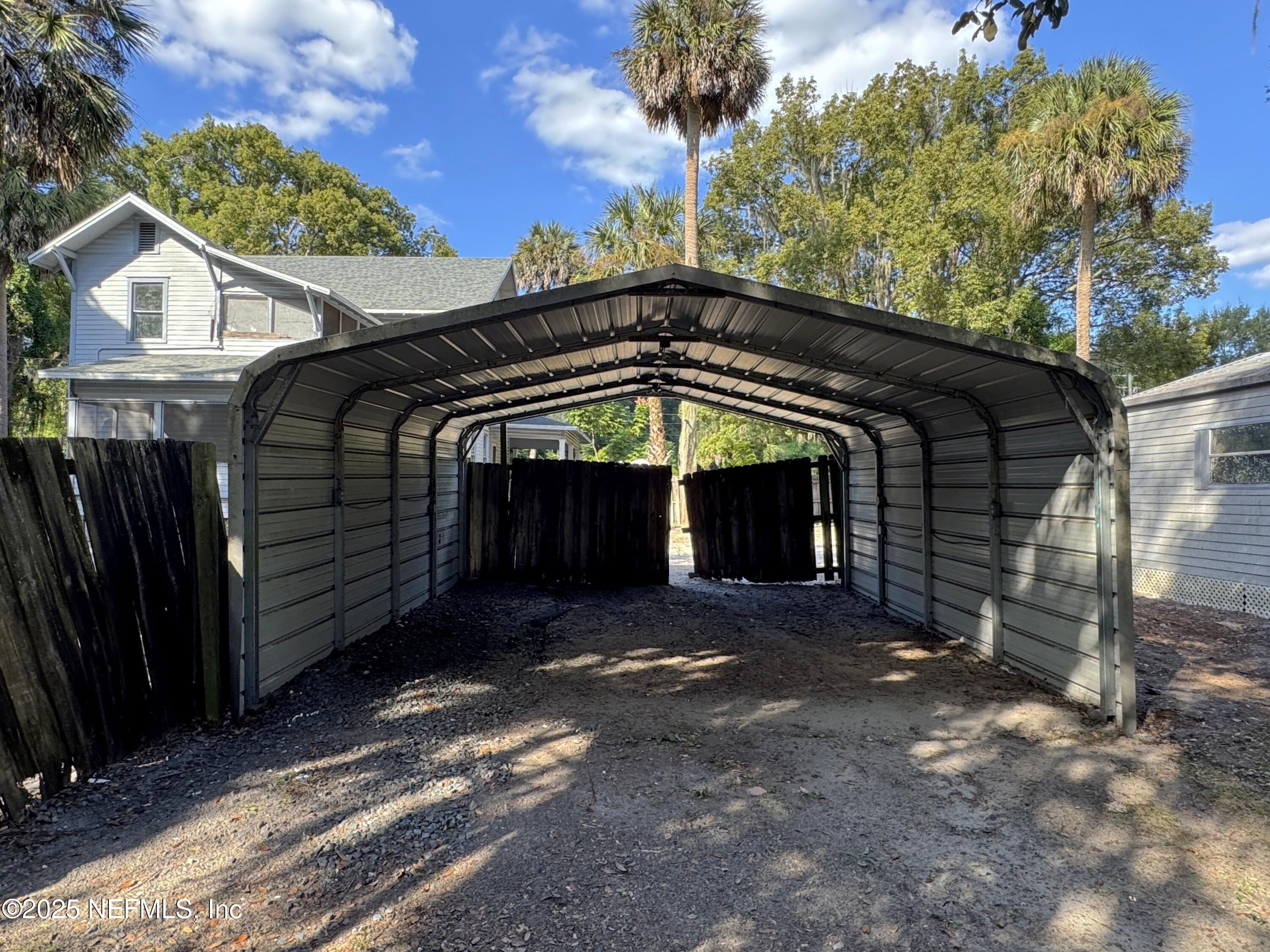 225 Lake George Road Seville, FL 32190 - Photo 37 of 37 a front view of a house with a yard