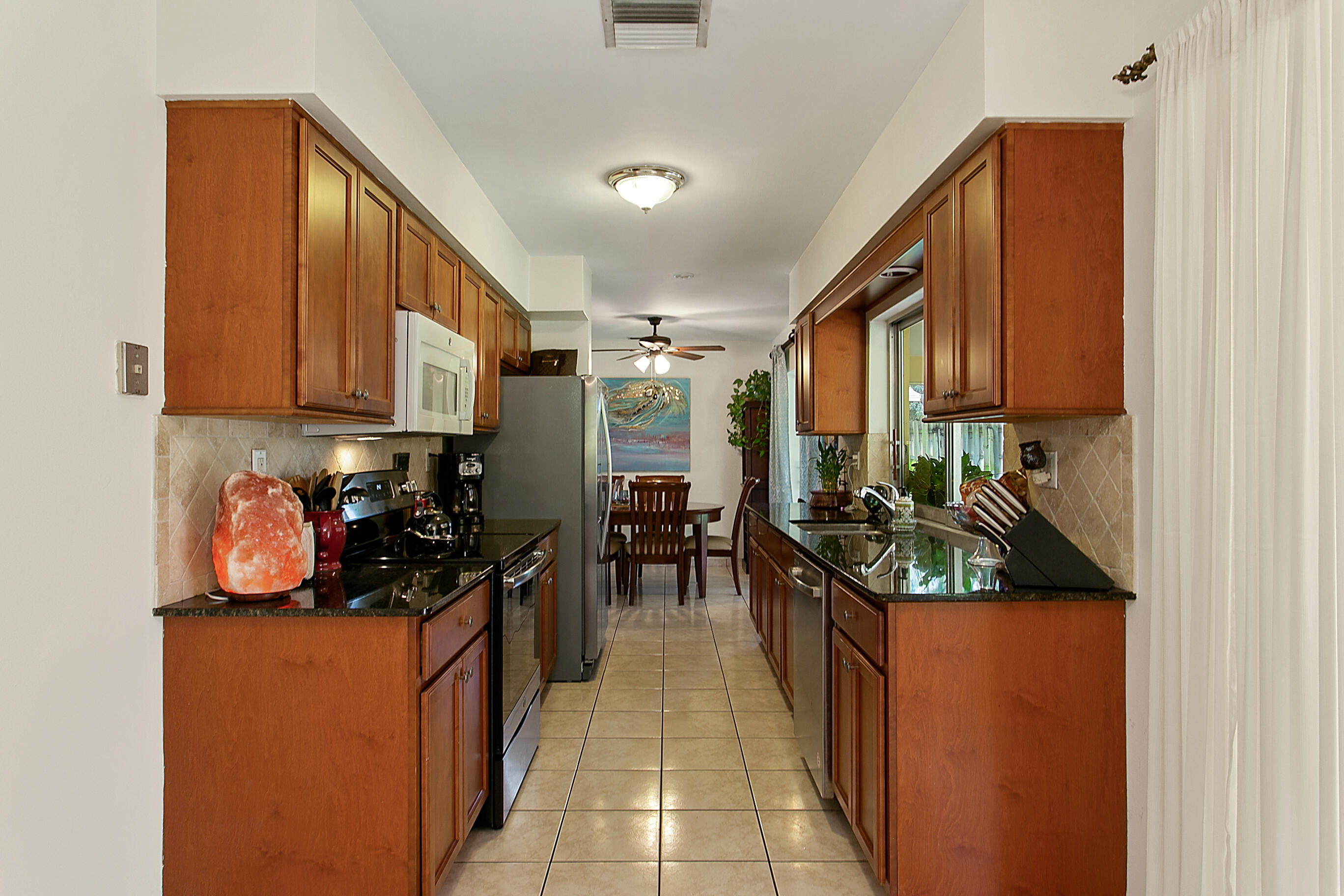 4899 Northwest 5th Avenue Boca Raton, FL 33431 - Photo 5 of 20 UPDATED KITCHEN W/GRANITE COUNTERS...