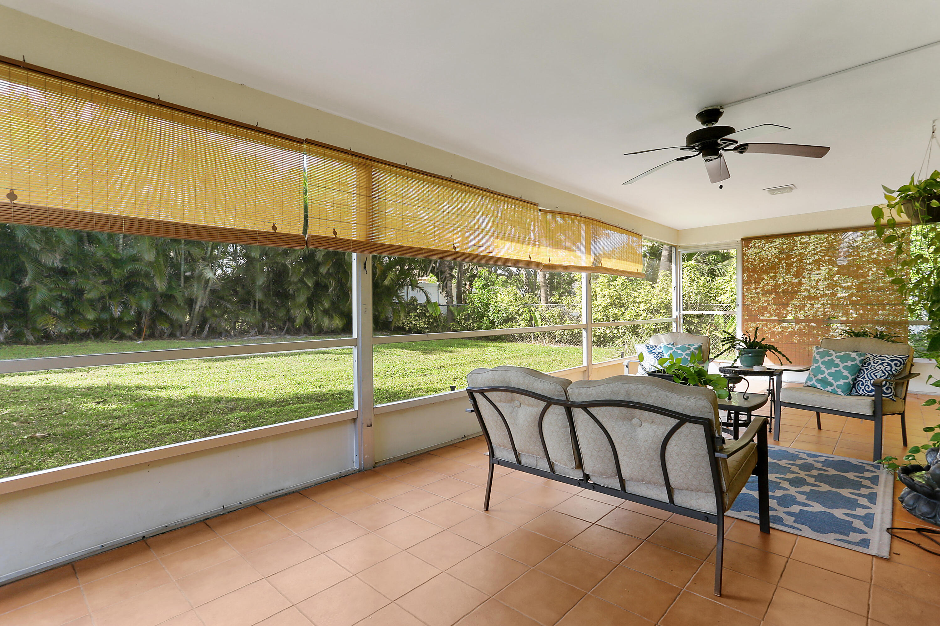 4899 Northwest 5th Avenue Boca Raton, FL 33431 - Photo 10 of 20 ENORMOUS COVERED SCREENED PATIO...