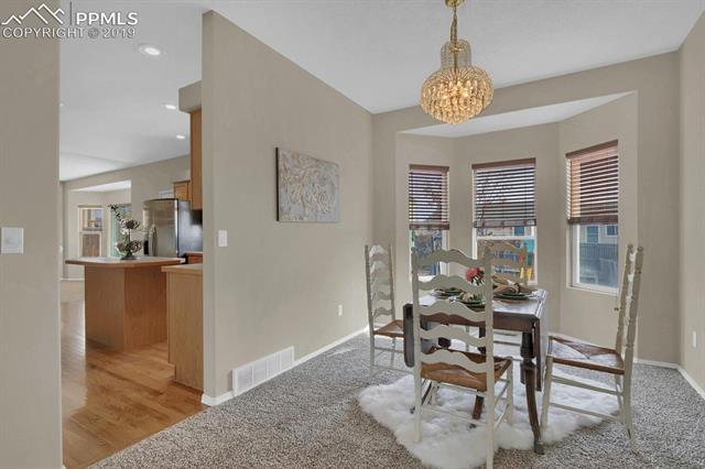 4415 Fencer Road Colorado Springs, CO 80911 - Photo 7 of 27 Another bay window in the dining room