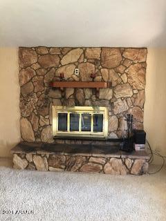 606 North Maranatha Road Payson, AZ 85541 - Photo 13 of 17 Master bedroom fireplace