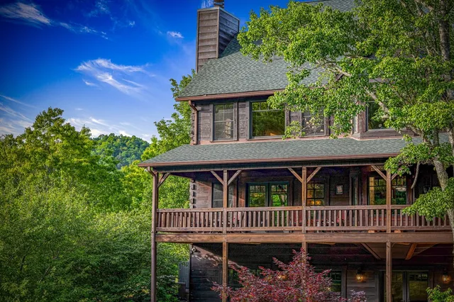 a bathroom with double vanity sink and a mirror