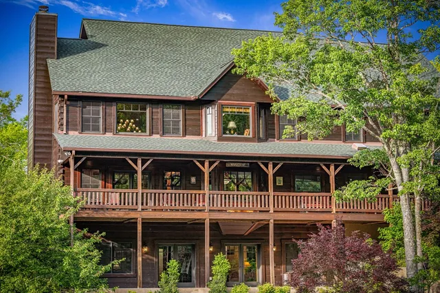 a bedroom with bed and a tv
