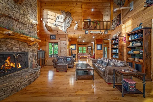 a bathroom with a granite countertop shower a sink and a mirror