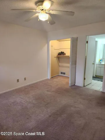 a view of a livingroom with a flat screen tv