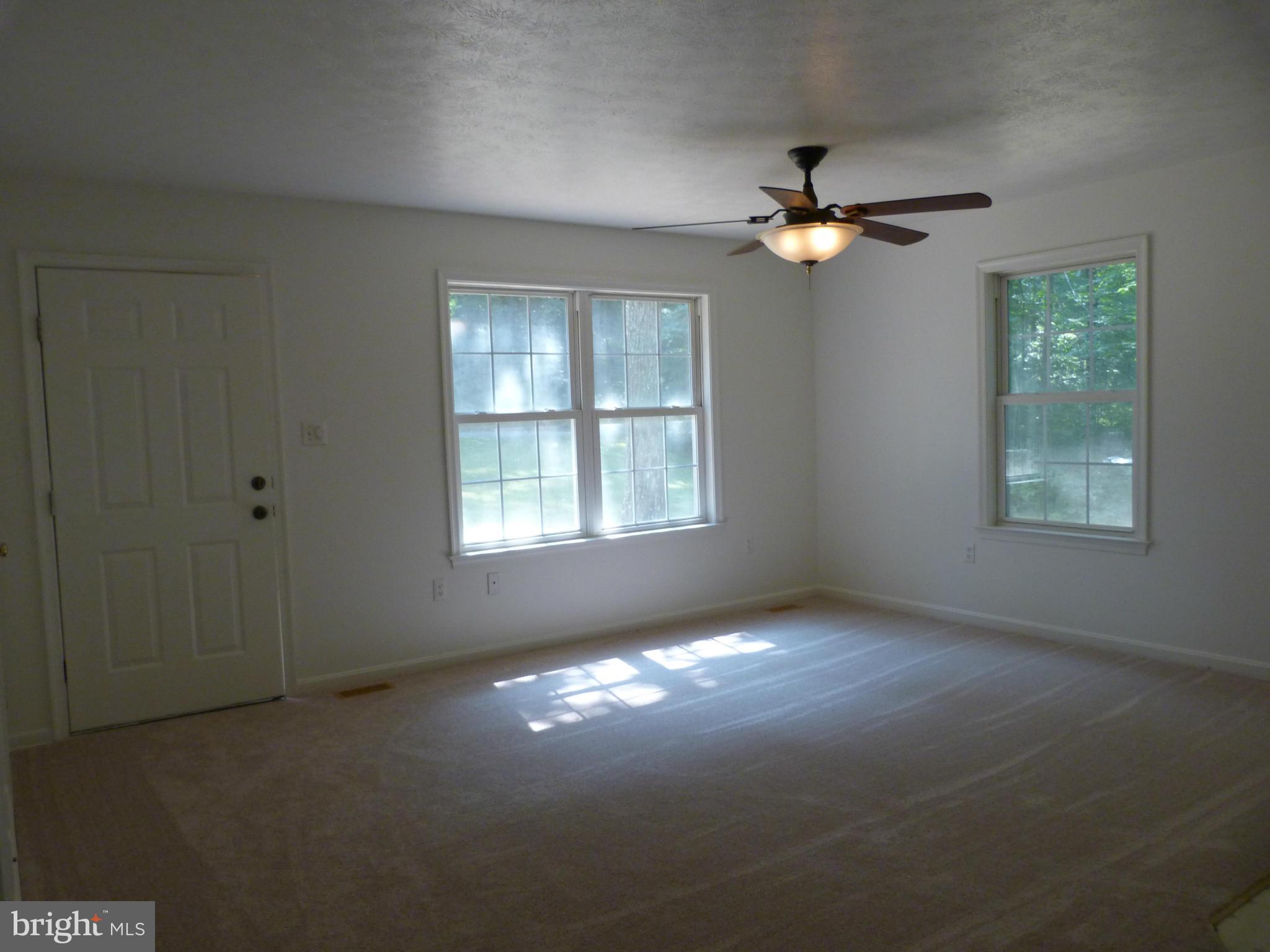 235 Freeze Road Linden, VA 22642 - Photo 3 of 10 an empty room that has a window