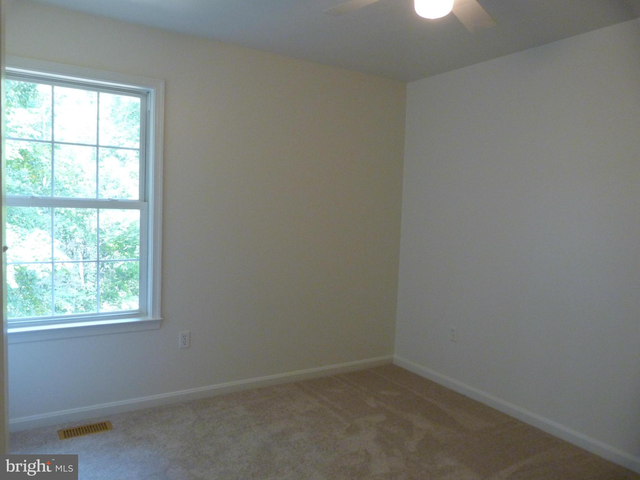 235 Freeze Road Linden, VA 22642 - Photo 7 of 10 an empty room with a window