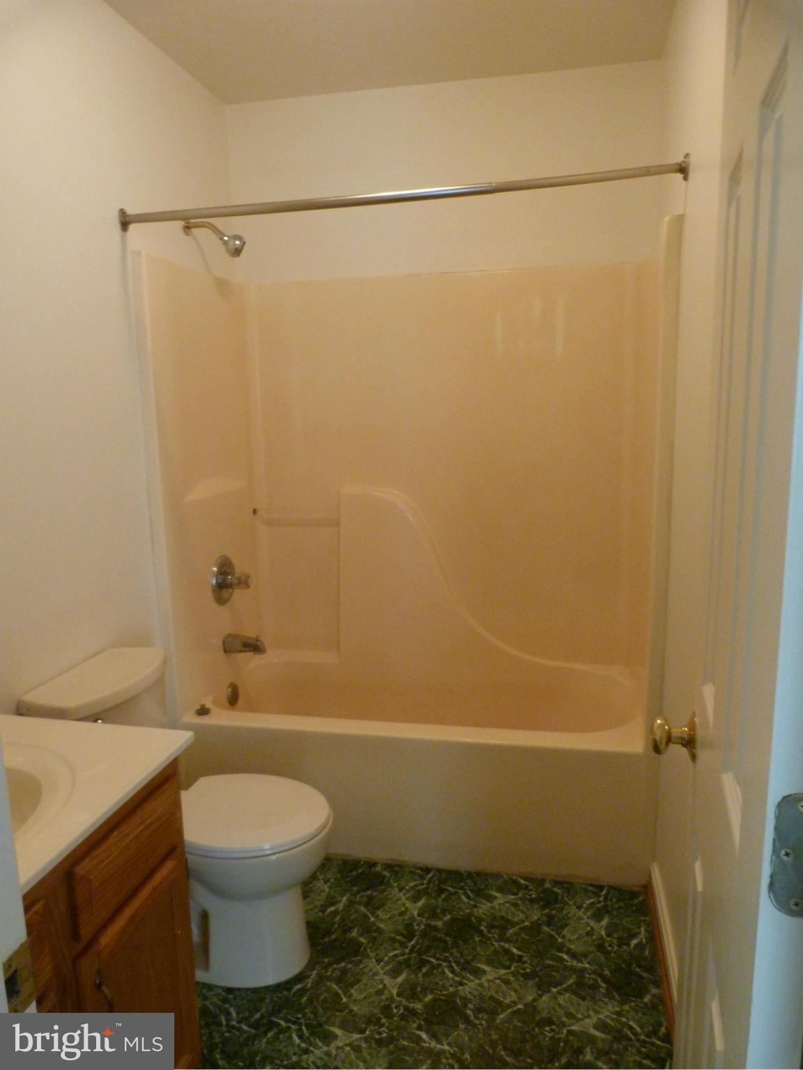 235 Freeze Road Linden, VA 22642 - Photo 8 of 10 a bathroom with a toilet and a shower