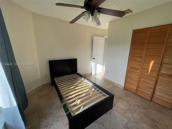 a view of wooden floor in an empty room