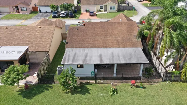 a view of a lake with a yard