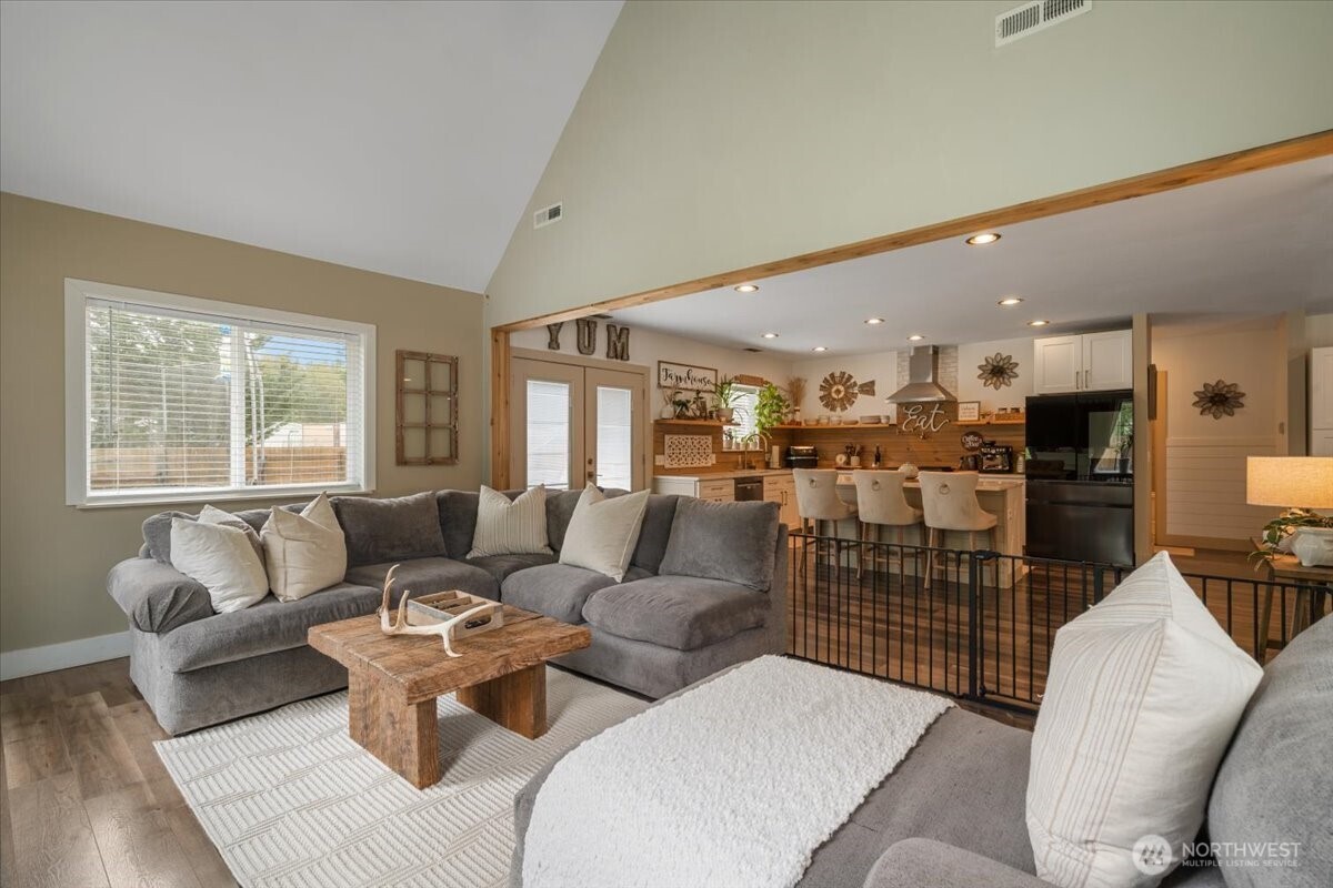 26709 Entwhistle Road East Buckley, WA 98321 - Photo 13 of 40 a living room with furniture kitchen and a table