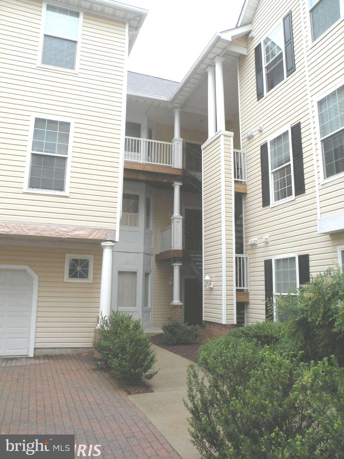 12705 Found Stone Road, Unit 301 Germantown, MD 20876 - Photo 2 of 21 a view of a house with a yard