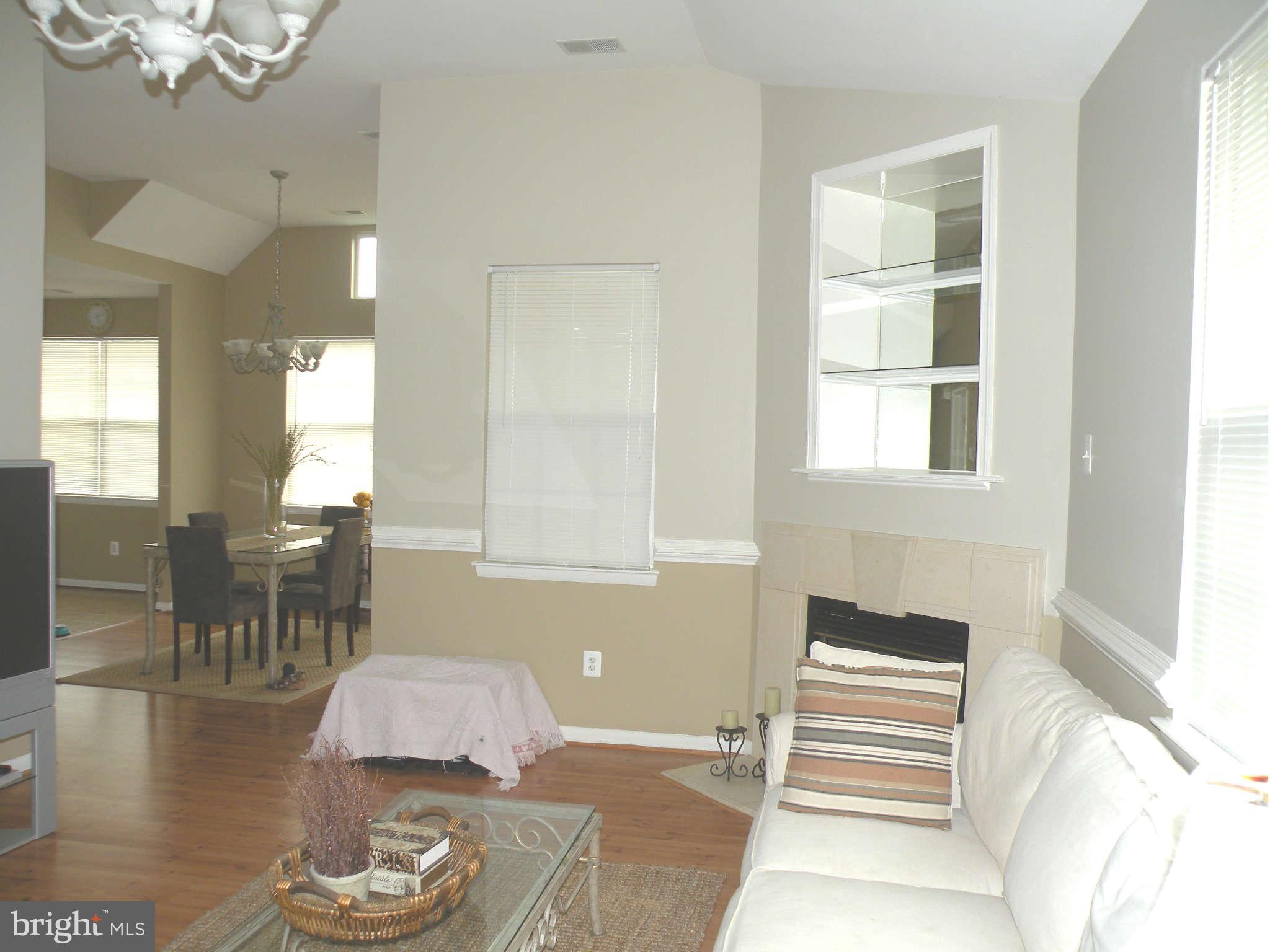 12705 Found Stone Road, Unit 301 Germantown, MD 20876 - Photo 8 of 21 a room with furniture and a window