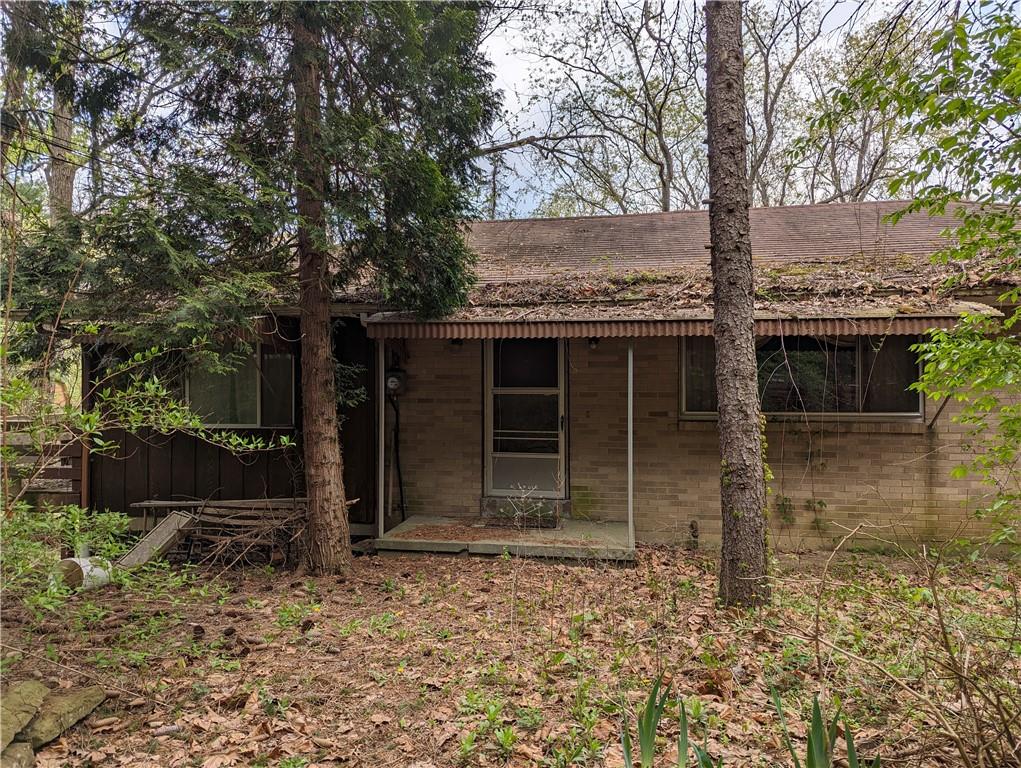 a house with trees in front of it