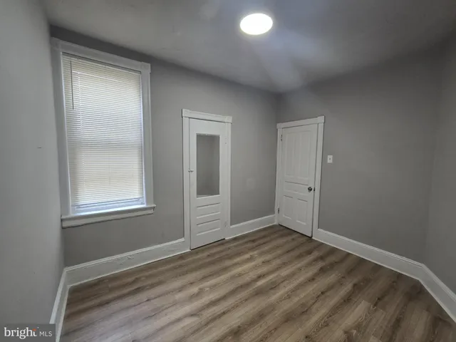 an empty room with window