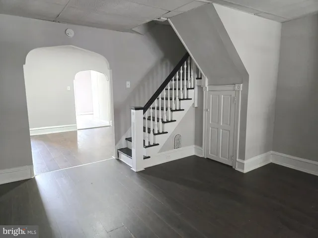 a view of entryway with wooden floor