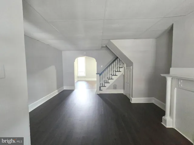 a view of entryway with wooden floor