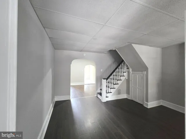 a view of entryway with wooden floor