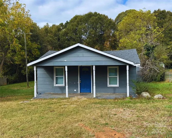 a house with garden in front of it