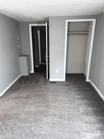 an empty room with closet