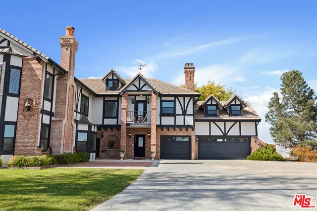 a outdoor living space with patio furniture and a potted plant