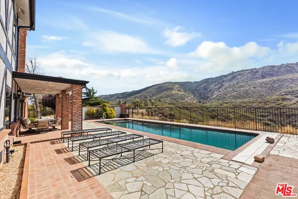 a view of an outdoor space and mountains