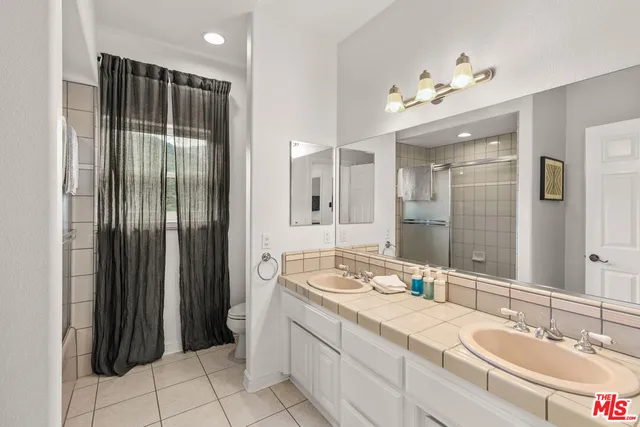 a view of a house with a mountain in the background