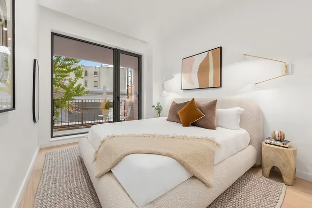 a kitchen with a sink a table and chairs