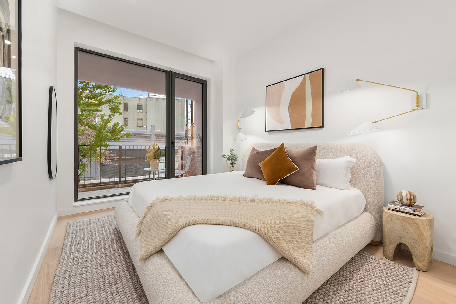 701 Prospect Place, Unit 202 Brooklyn, NY 11216 - Photo 4 of 7 a bedroom with a large bed and a window