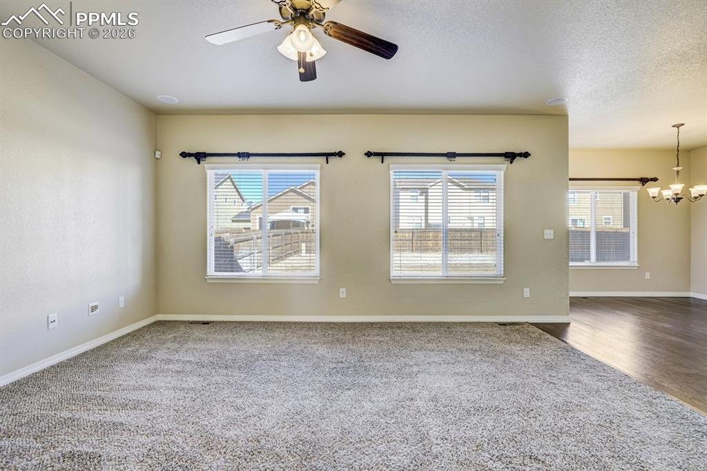 Undisclosed Address Colorado Springs, CO 80925 - Photo 11 of 45 a view of an empty room with a window