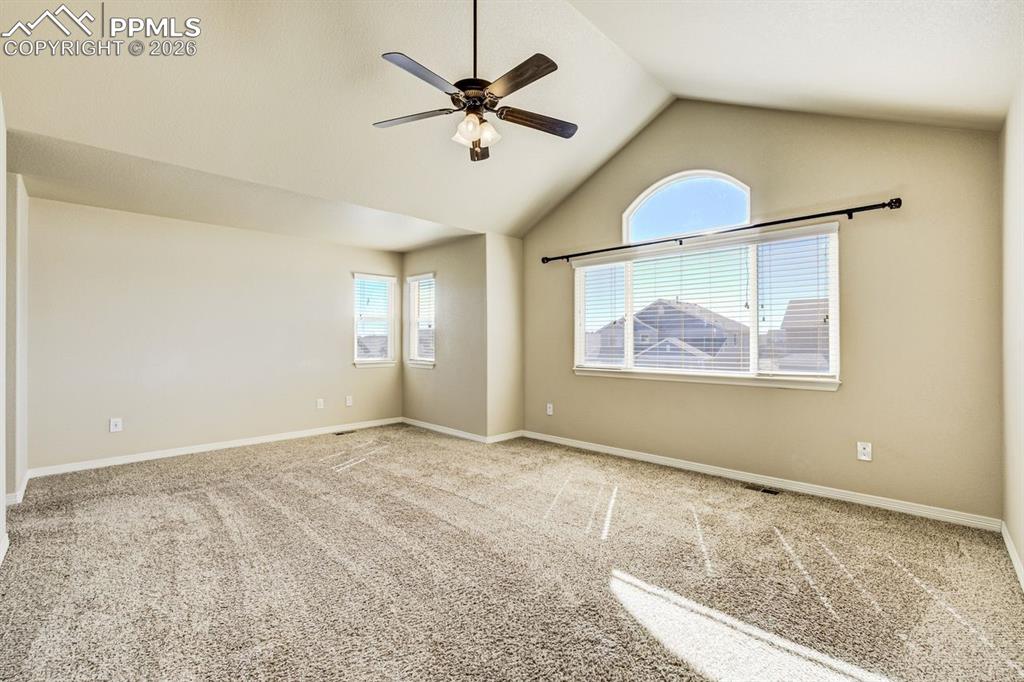 Undisclosed Address Colorado Springs, CO 80925 - Photo 25 of 45 an empty room with windows and fan