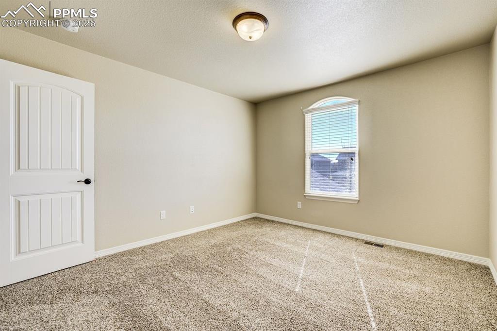 Undisclosed Address Colorado Springs, CO 80925 - Photo 32 of 45 an empty room with windows