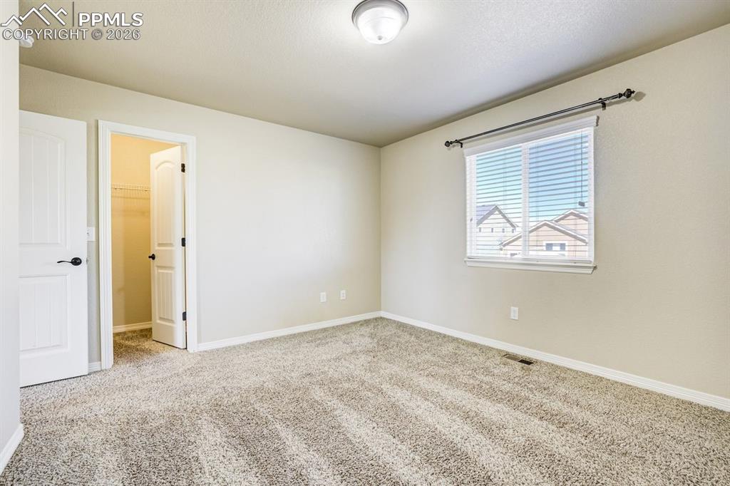 Undisclosed Address Colorado Springs, CO 80925 - Photo 38 of 45 an empty room with windows