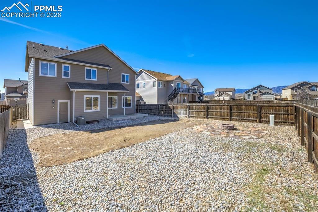 Undisclosed Address Colorado Springs, CO 80925 - Photo 43 of 45 a view of a house with a snow in the background