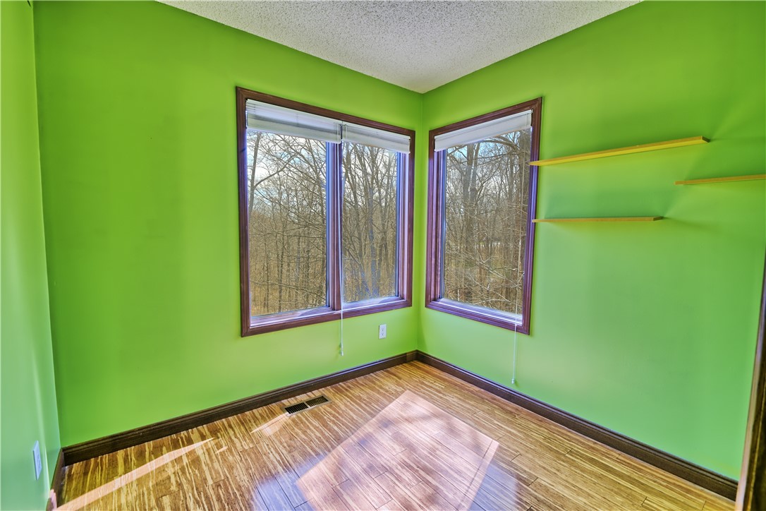 8711 Nicole Lane Springboro, OH 45066 - Photo 51 of 87 Bright room with natural light and beautiful views of the surrounding trees.