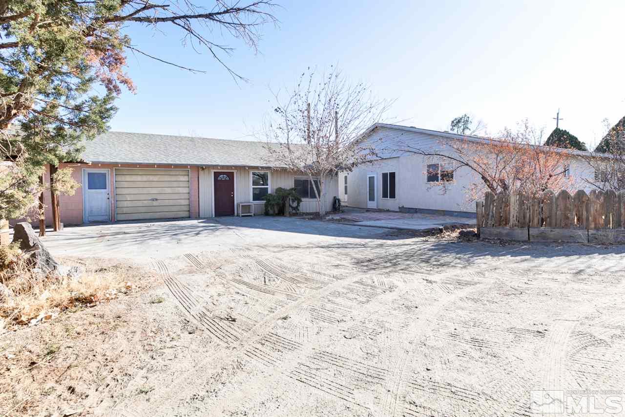 4320 Reno Highway Fallon, NV 89406 - Photo 2 of 28 a large house with a large tree in front of it