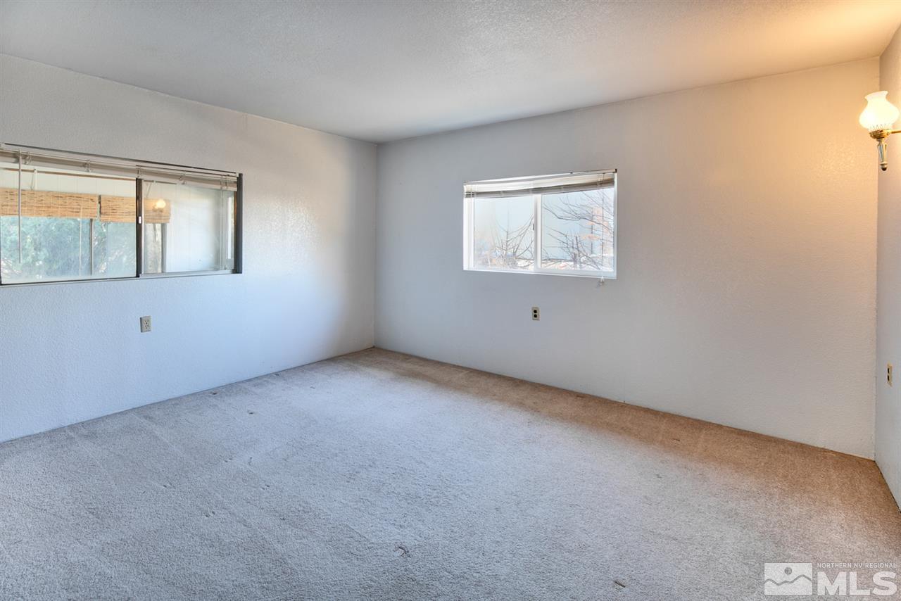 4320 Reno Highway Fallon, NV 89406 - Photo 10 of 28 an empty room with a window