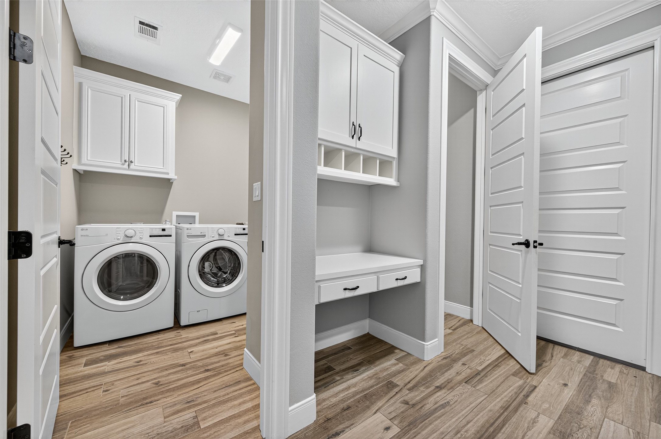 12322 High Fire Road Montgomery, TX 77356 - Photo 28 of 45 More custom built in cabinets/desk near the laundry room and staircase.