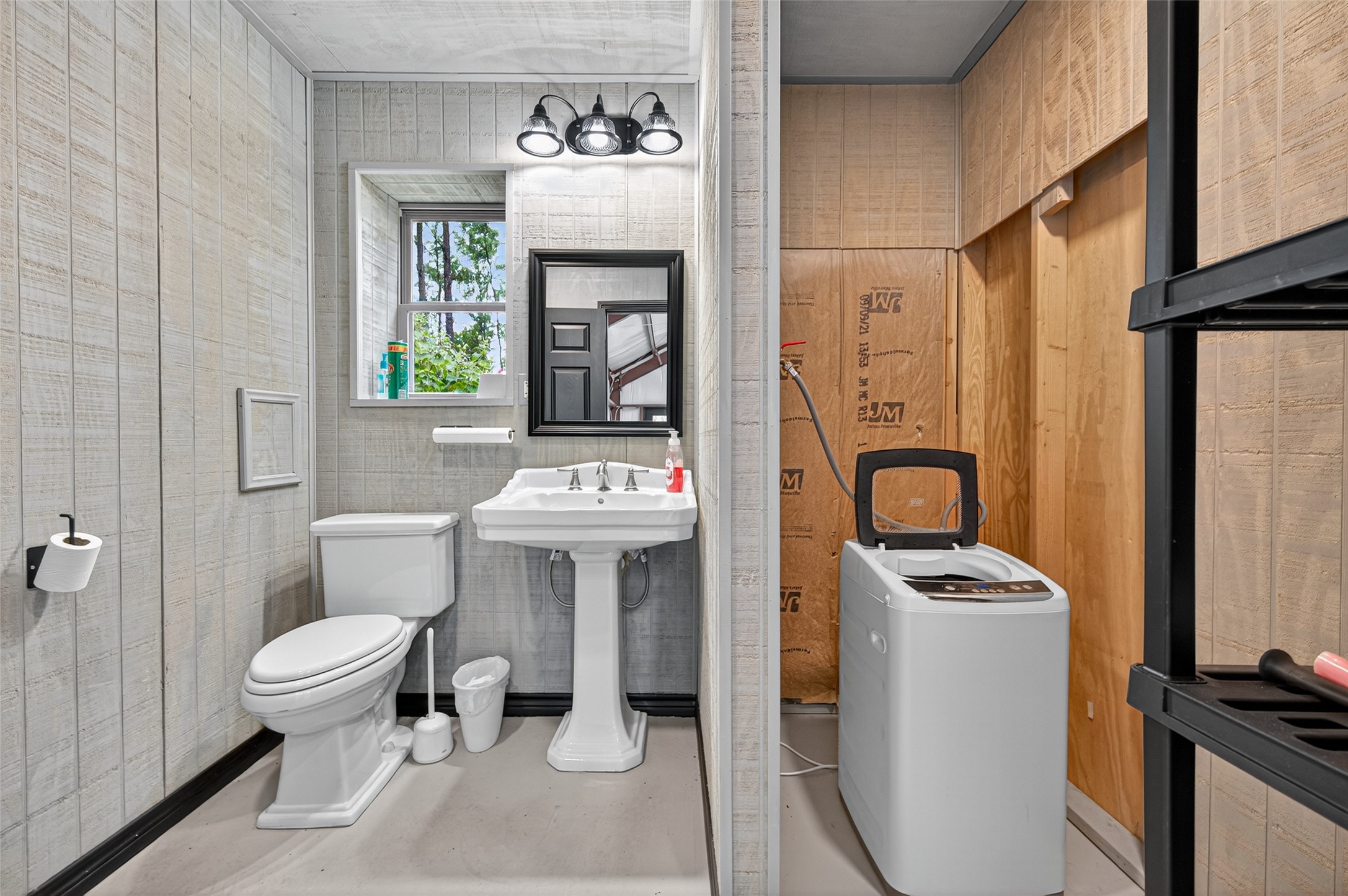 12322 High Fire Road Montgomery, TX 77356 - Photo 40 of 45 Half bath and laundry area in the shop.