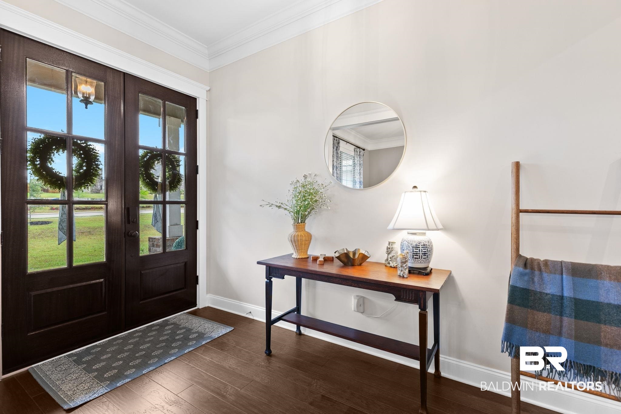 13233 Ibis Boulevard Daphne, AL 36527 - Photo 5 of 100 Entryway featuring dark wood-finish double doors with glass panels, rich wood-finish flooring, white baseboards, and crown molding