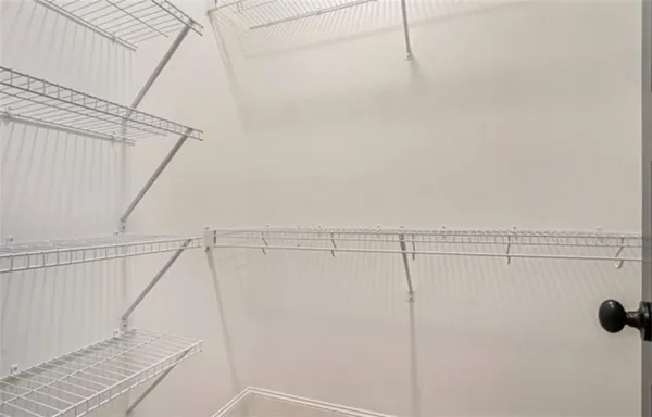 a view of a room with racks on the wall